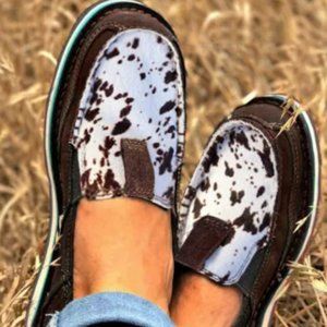 Cow print slip on shoes